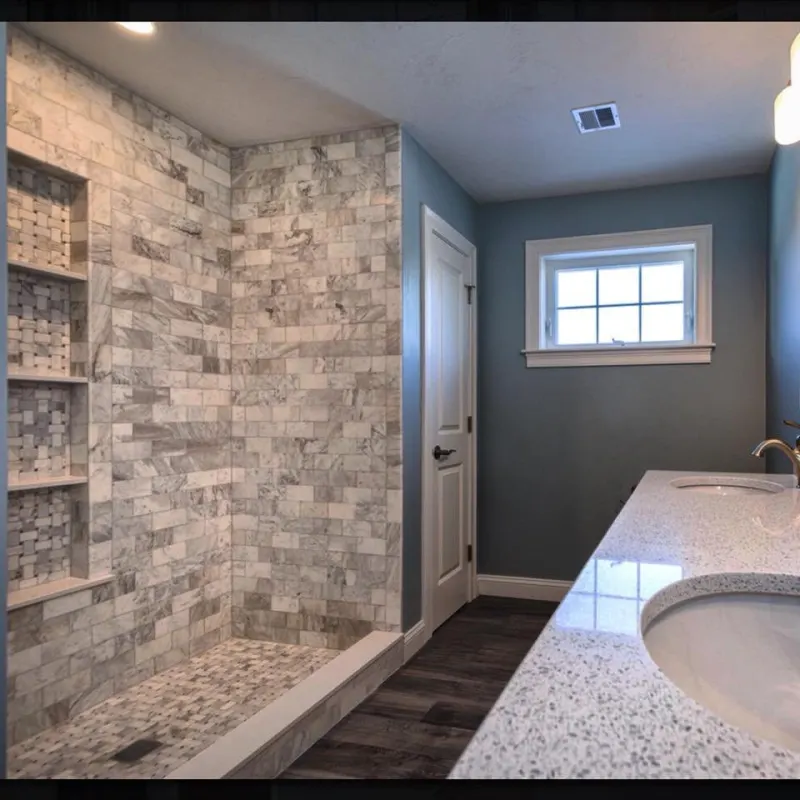 Stone tile bathroom shower