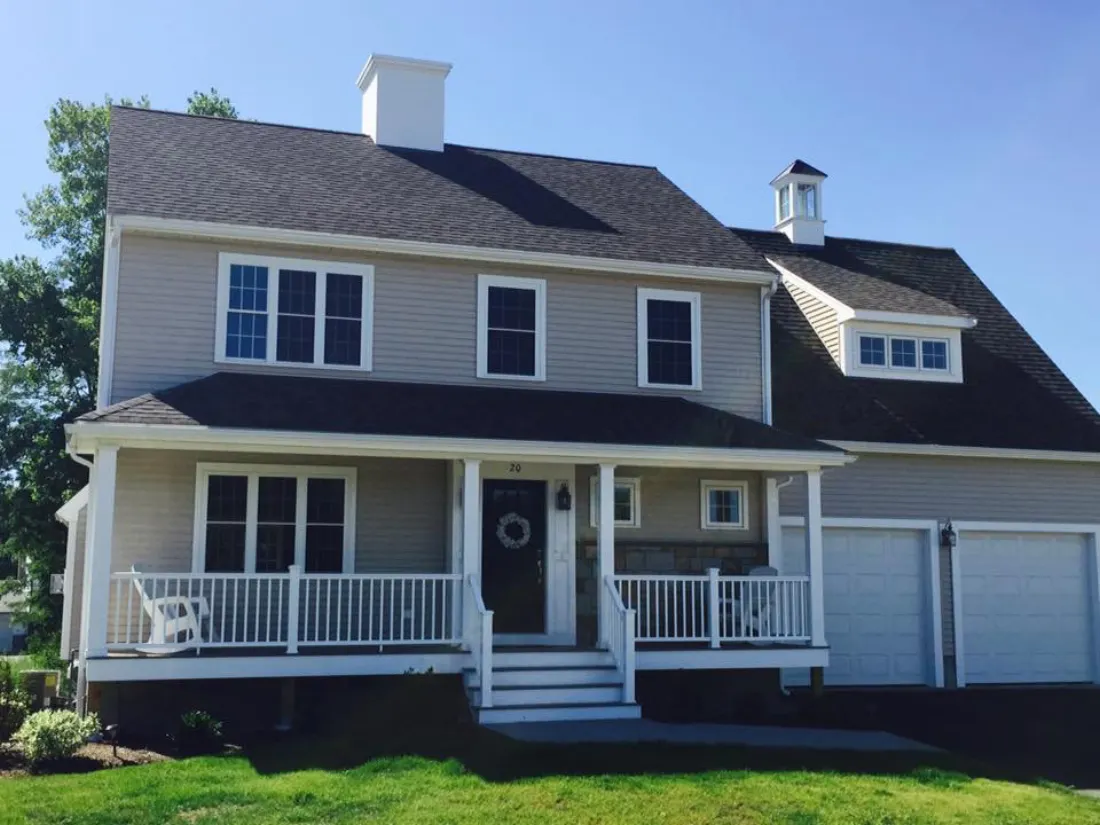 Colonial home with farmer's porch built by Pioneer Custom Builders
