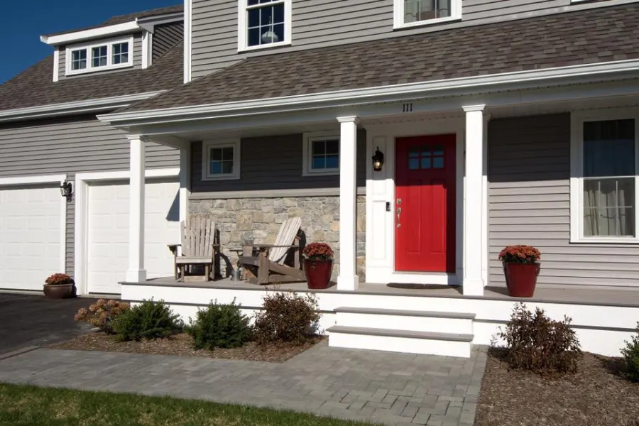Gray home with red front door